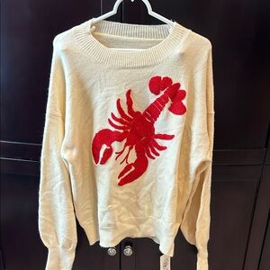 Cider Cream Sweater with Red Lobster Motif